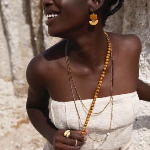 Beachcomber Necklace is made from glass beads, freshwater pearl & cotton cording. Handmade in Ecuador $38