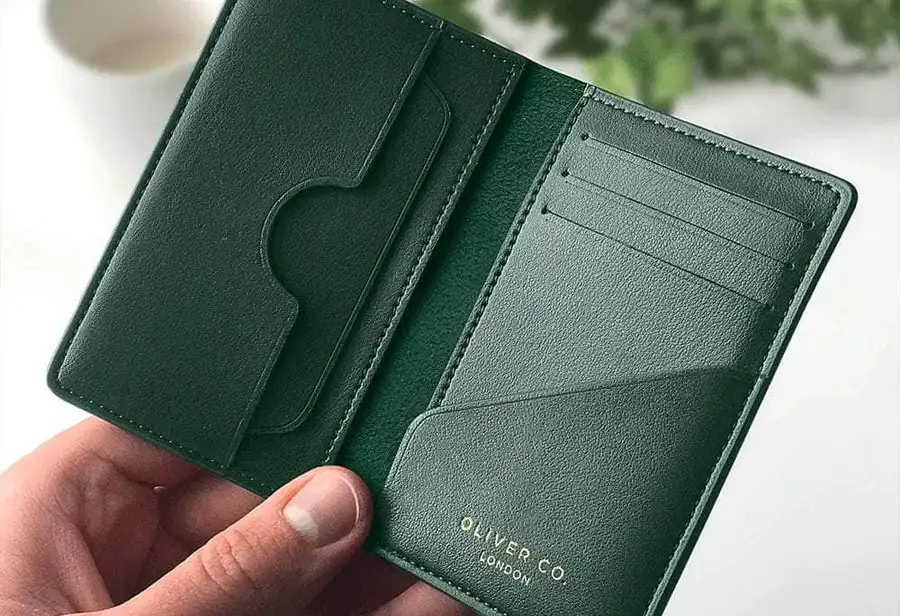 Oliver Co Compact Wallet is made from apple leather and recycled suede. $129