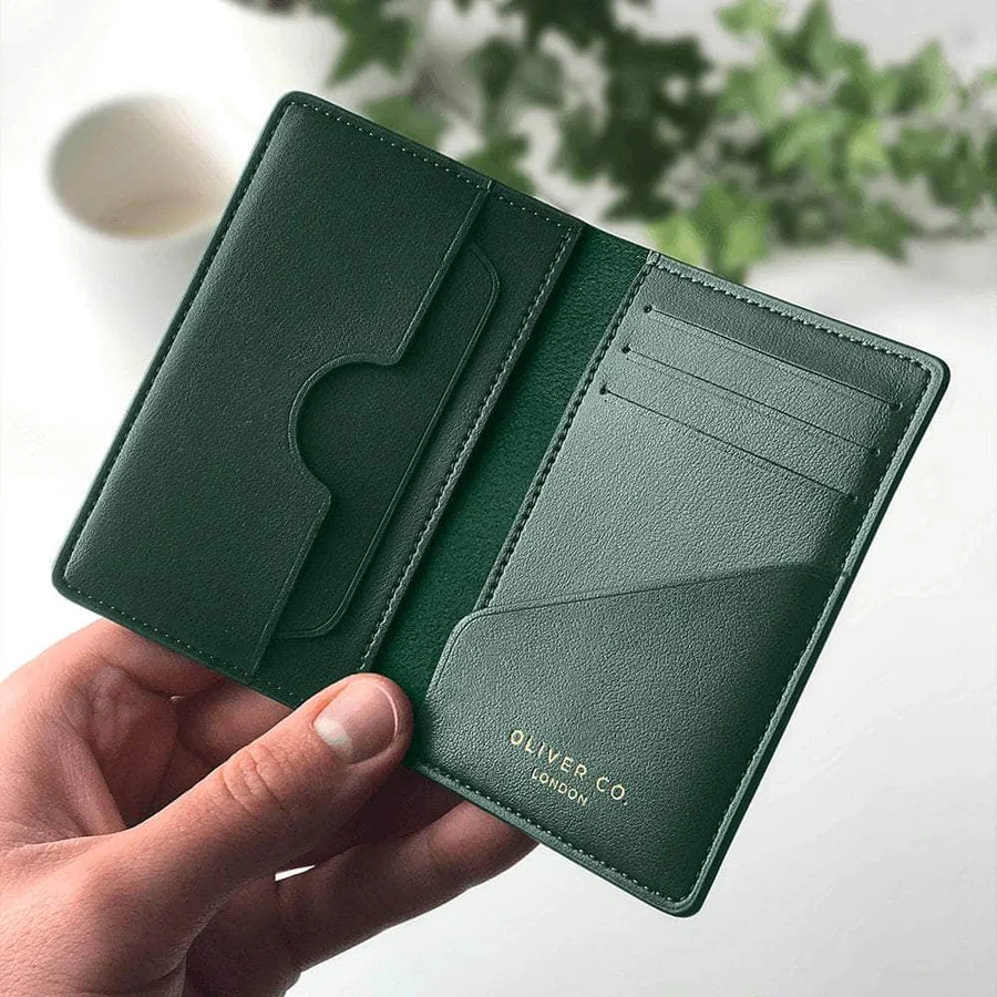 Oliver Co Compact Wallet is made from apple leather and recycled suede. $129