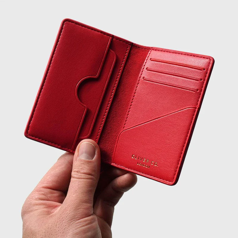 Oliver Co Compact Wallet is made from apple leather and recycled suede. $129