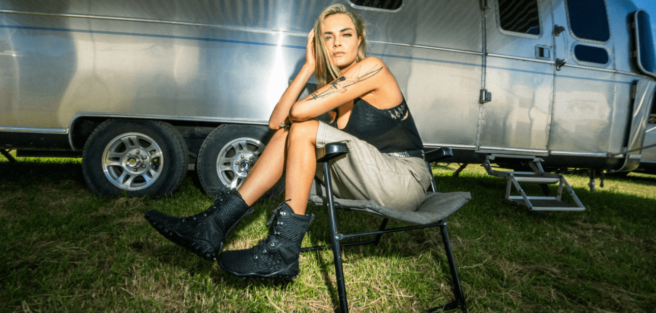 Cara Delevingne wearing Vivobarefoot Jungle ESC boots